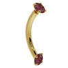 14k yellow gold ruby prong-set curved barbell, angled side view showing dual ruby ends