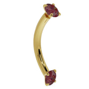 14k yellow gold ruby prong-set curved barbell, angled side view showing dual ruby ends