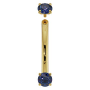 14K yellow gold blue sapphire curved barbell with top ball detached, showing threaded screw-on end