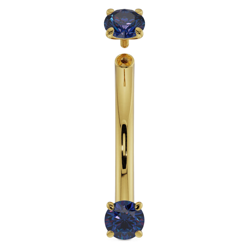 14K yellow gold blue sapphire curved barbell with top ball detached, showing threaded screw-on end