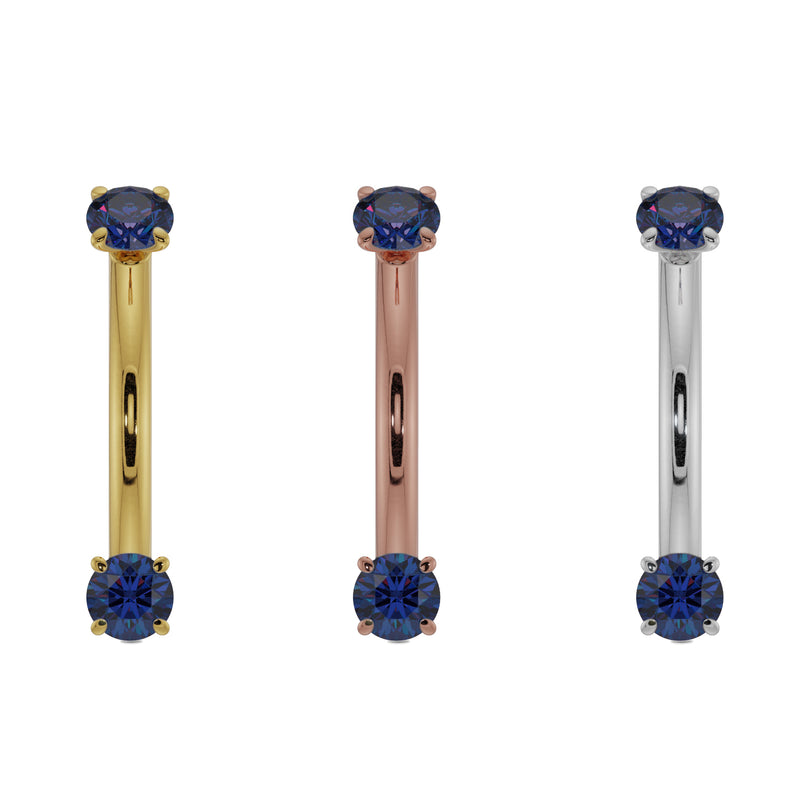 Blue sapphire prong-set curved barbell in all three 14K gold options: yellow, rose, and white gold