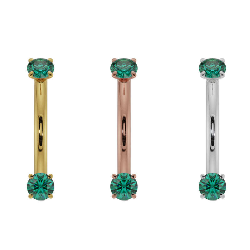 Emerald prong-set curved barbell in all three 14K gold colors: yellow, rose, and white gold