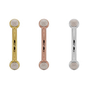 Pearl bezel curved barbell in all three 14k gold colors: yellow, rose, and white gold side by side