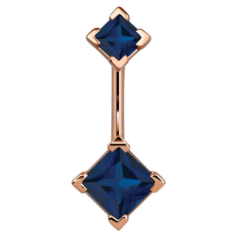 14k rose gold belly ring with double dark blue princess-cut CZ gems in four-prong settings, front view