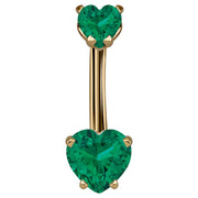 14k yellow gold belly ring with dual dark green CZ heart stones in prong settings, front view