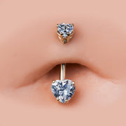 14k rose gold heart CZ belly ring shown in navel piercing, close-up fit view