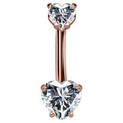 14k rose gold belly ring with dual clear CZ heart stones in prong settings, front view