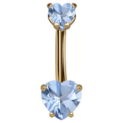 14k yellow gold navel ring with dual light blue CZ heart stones in prong settings, front view