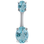 14k white gold belly ring with dual light blue oval CZ stones in four-prong settings, front view