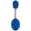 14k white gold navel ring with dual deep blue oval CZ stones in four-prong settings, front view
