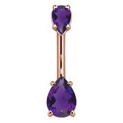 14k rose gold navel ring with dual purple pear-cut CZ stones in four-prong settings, front view