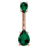 14k rose gold navel ring with dual dark green pear-cut CZ gems in prong settings, front view