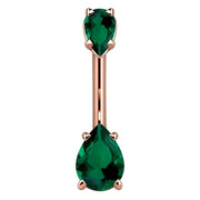 14k rose gold navel ring with dual dark green pear-cut CZ gems in prong settings, front view