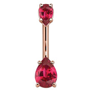 14k rose gold belly ring with two red pear-shaped CZ gems in four-prong settings, front view