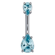 14k white gold belly ring with two light blue pear-shaped CZ gems in prong settings, front view