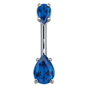 14k white gold belly ring with two sapphire blue pear-shaped CZ gems in prong settings