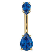 14k yellow gold navel ring featuring two deep blue pear-shaped CZ stones in prong settings