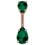 14k rose gold belly ring with double dark green pear-cut CZ gems in prong settings, front view