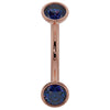 Close-up of 14k rose gold curved barbell highlighting deep blue sapphire bezel ends