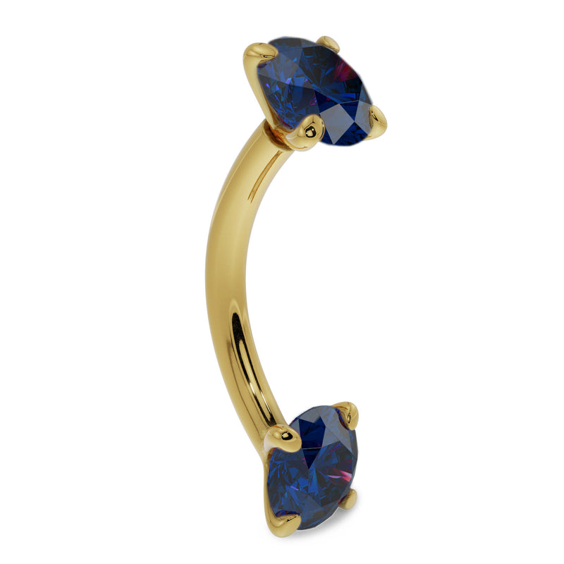14k yellow gold blue sapphire curved barbell, side profile showing dual prong-set stones and curved shaft