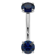 14k white gold blue sapphire prong-set curved barbell, front view with dual round sapphire ends