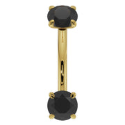 14k yellow gold 14G curved barbell with larger 3mm prong-set black diamonds, front view