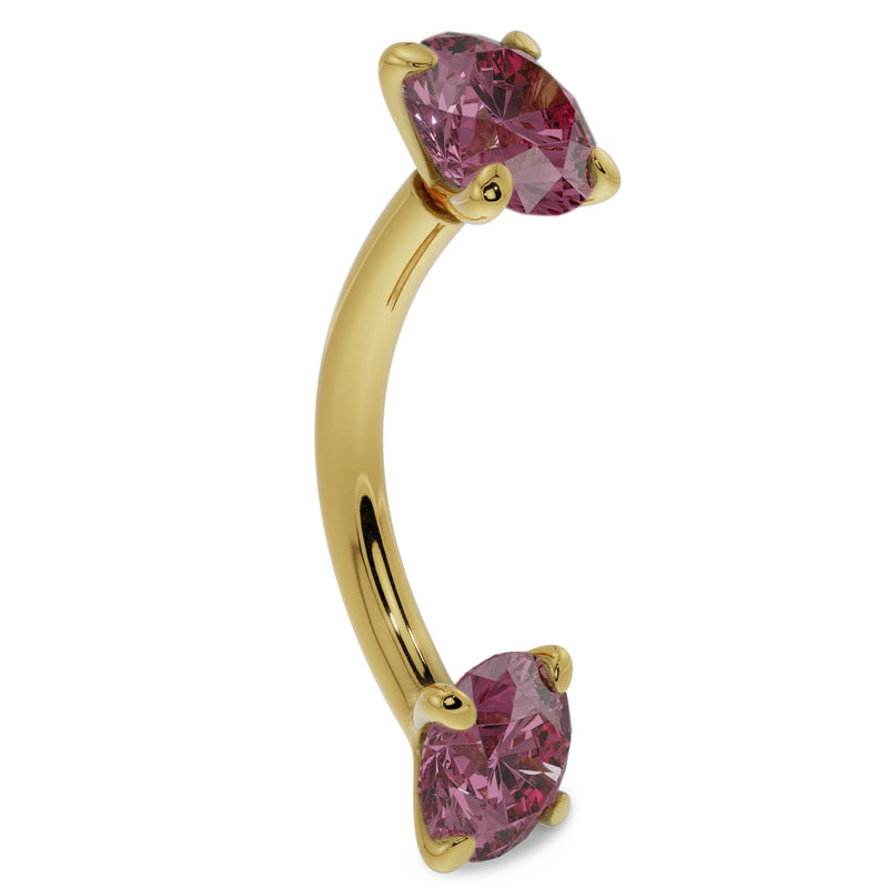 14k yellow gold pink sapphire curved barbell, angled side view showing curved bar and prong-set gems