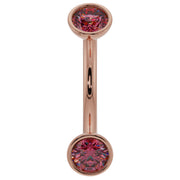 14k rose gold ruby bezel curved barbell with dual round rubies, front view