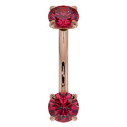 14k rose gold ruby curved barbell with dual prong-set rubies, front view