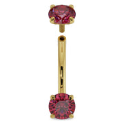 14k yellow gold ruby curved barbell with top end unscrewed, showing threaded post and larger ruby ends