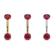 Larger ruby prong-set curved barbell in 14k yellow, rose, and white gold shown side by side for color comparison