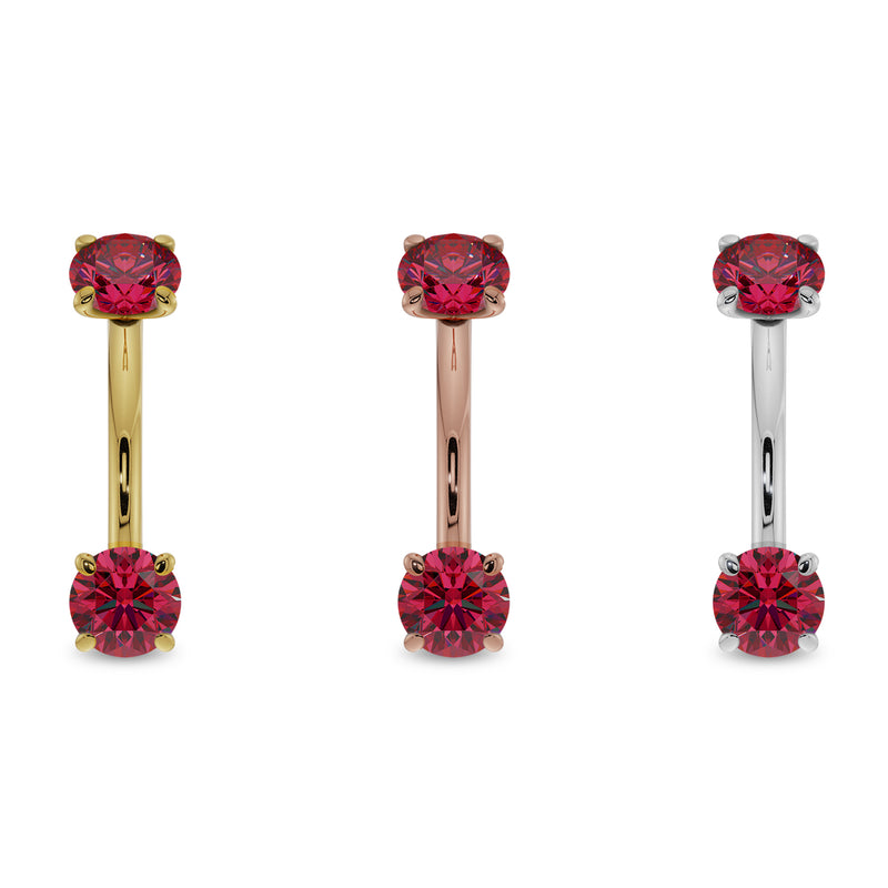 Larger ruby prong-set curved barbell in 14k yellow, rose, and white gold shown side by side for color comparison