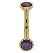 14k yellow gold 14G amethyst curved barbell showing larger 4mm bezel-set gemstones, front view
