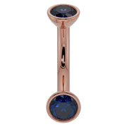 14k rose gold 14G curved barbell with 4mm bezel-set blue sapphires, belly ring gauge front view