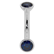 14k white gold 14G curved barbell with 4mm bezel-set blue sapphires, belly ring gauge front view