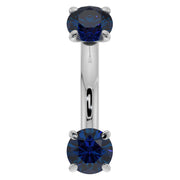14k white gold 14G blue sapphire curved barbell front view, larger stones ideal for belly button piercing