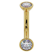 14k yellow gold diamond bezel-set belly ring curved barbell with larger domed bezel ends, front view