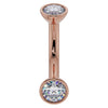 14K rose gold 14G CZ bezel curved barbell with larger 4mm CZ ends, belly ring gauge