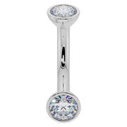 14K white gold 14G CZ bezel curved barbell with larger 4mm CZ ends, belly ring gauge