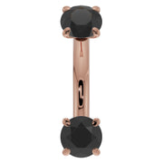 14k rose gold black diamond prong-set curved barbell, front view with warm rose tone against dark stones
