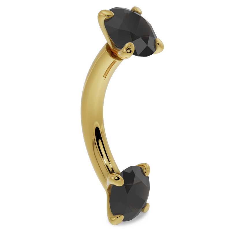 14k yellow gold black diamond curved barbell angled view highlighting the banana curve and faceted stones