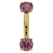 14k yellow gold pink sapphire belly ring, 14G front view with larger prong-set round stones