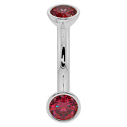 14k white gold ruby bezel belly ring with larger ruby ends, front view showing bright red stones