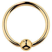 14K yellow gold fixed bead ring, front view showing mirror-polished hoop and captive bead