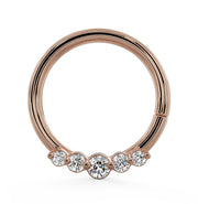 14K rose gold CZ seam ring hoop with five graduated cubic zirconia stones, front view