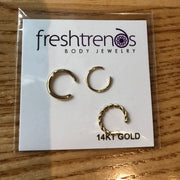 14k gold band ear cuffs in FreshTrends packaging, labeled 14KT gold with smooth and twisted styles