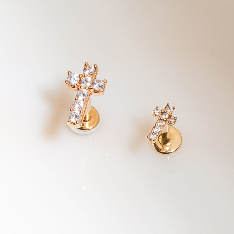 Two rose gold diamond cross flat back studs side by side, showing front and back disc from different angles