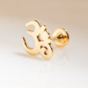 14k yellow gold Om ohm flat back stud angled on gradient background showing threaded ball end