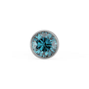 Close-up top-down view of 1.5mm blue diamond in white gold bezel setting, full sparkle detail