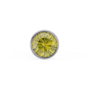 Close-up of 1.5mm yellow diamond in white gold bezel setting, top-down view showing facets